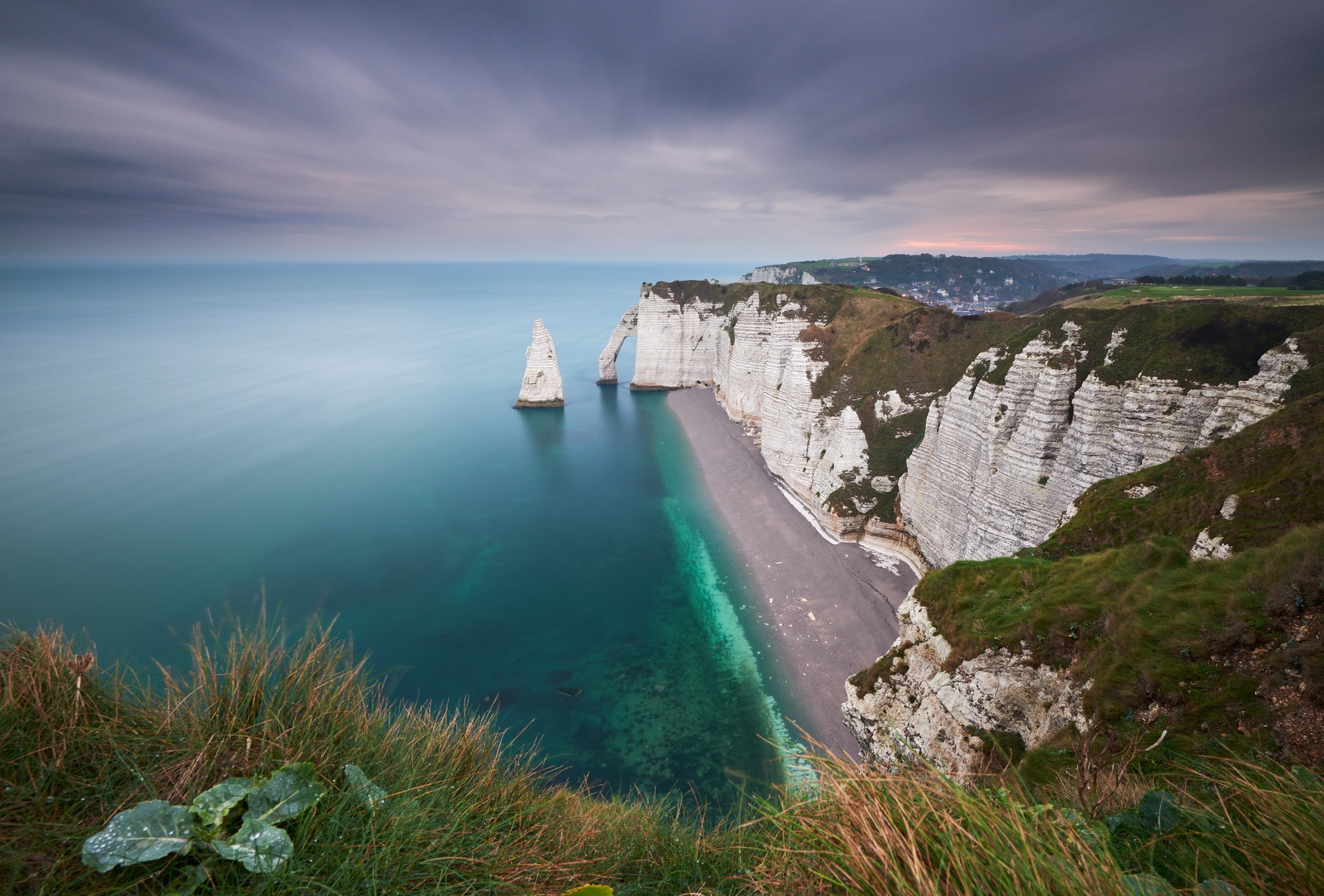 The cliffs of Étretat at sunrise on a misty November morning